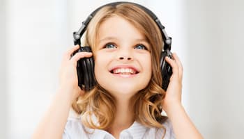 Child with wireless headphones